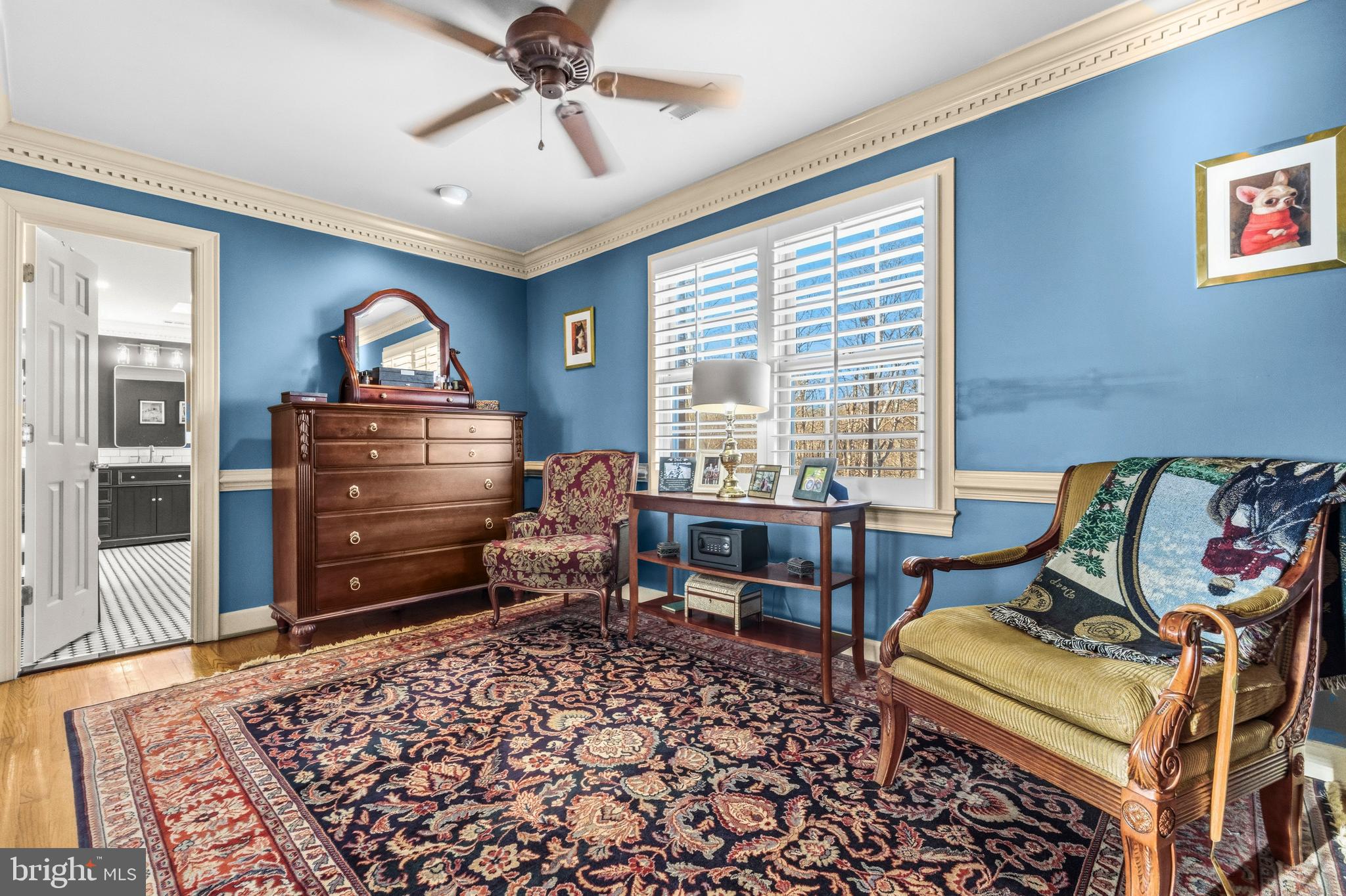 4514 Den Haag Road Warrenton, VA 20187 - Photo 25 of 56 a living room with furniture a dining table and with wooden floor