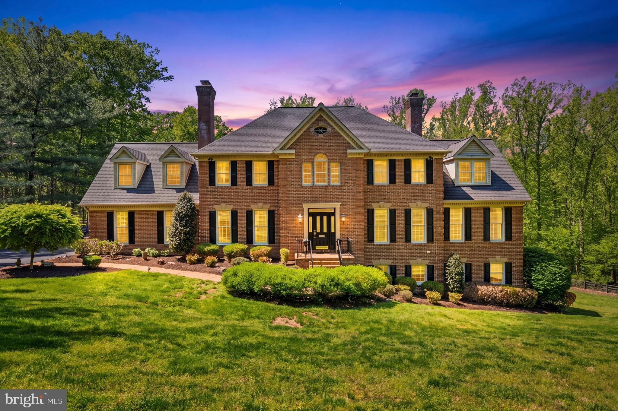 4514 Den Haag Road Warrenton, VA 20187 - Photo 47 of 67 a front view of a house with a garden
