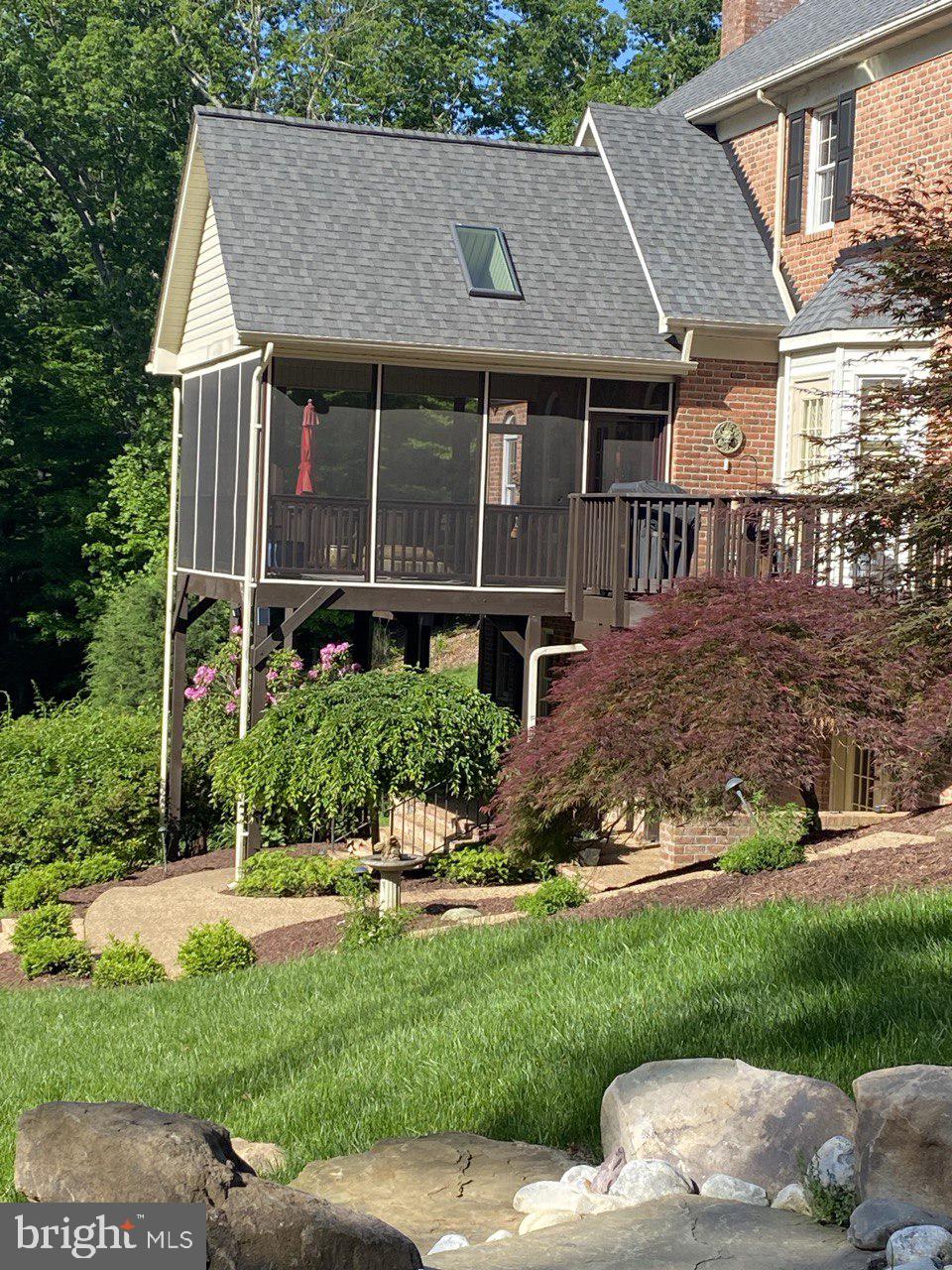 4514 Den Haag Road Warrenton, VA 20187 - Photo 50 of 56 a front view of a house with a yard