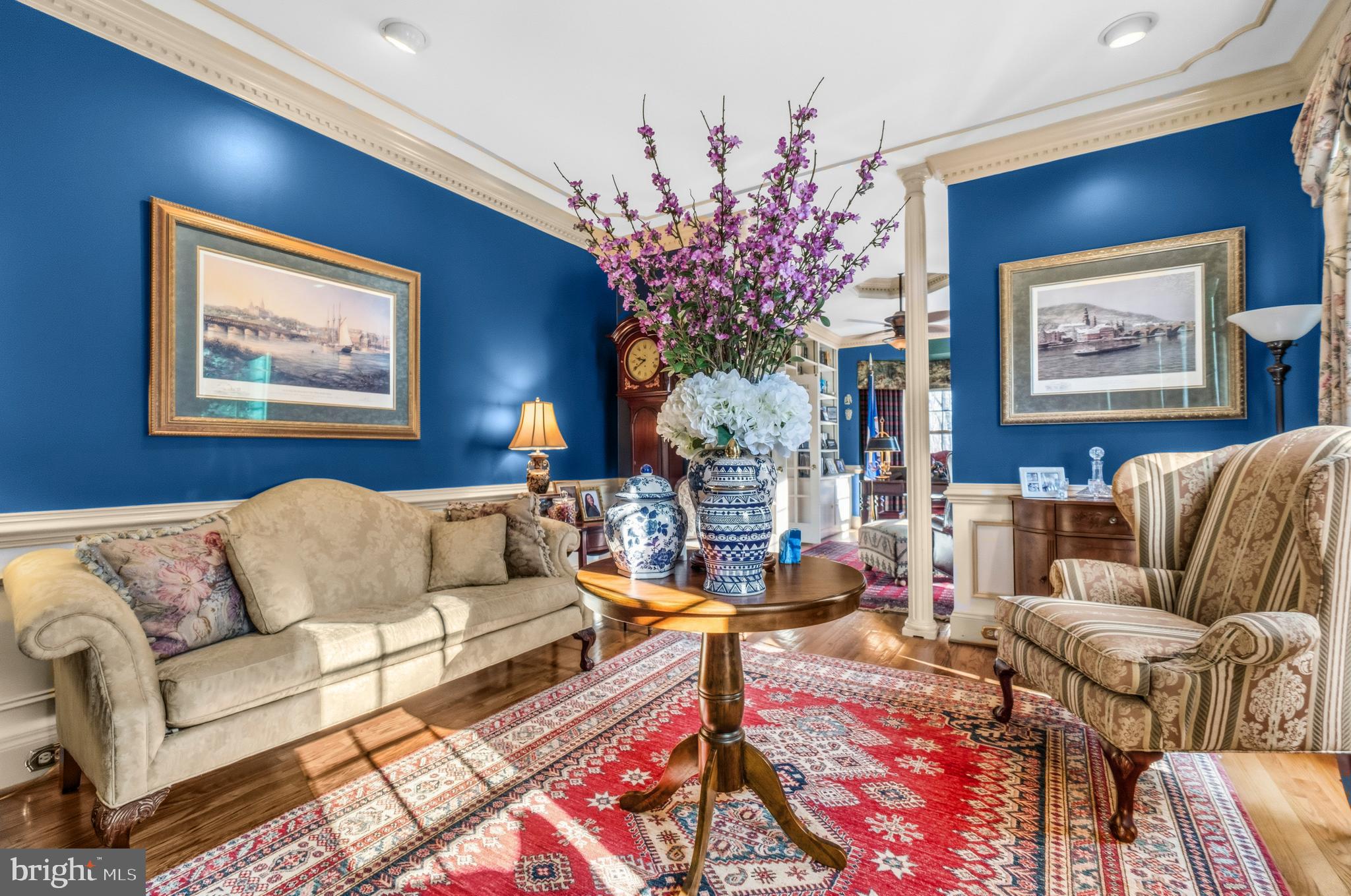 4514 Den Haag Road Warrenton, VA 20187 - Photo 5 of 56 a living room with furniture flowers and a rug