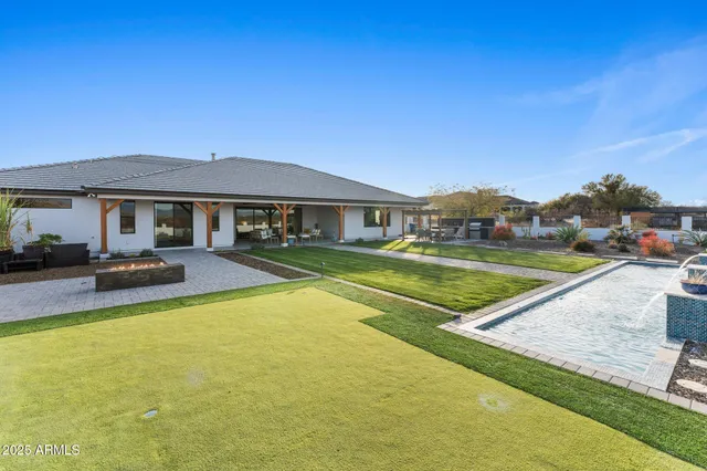 a view of a house with swimming pool