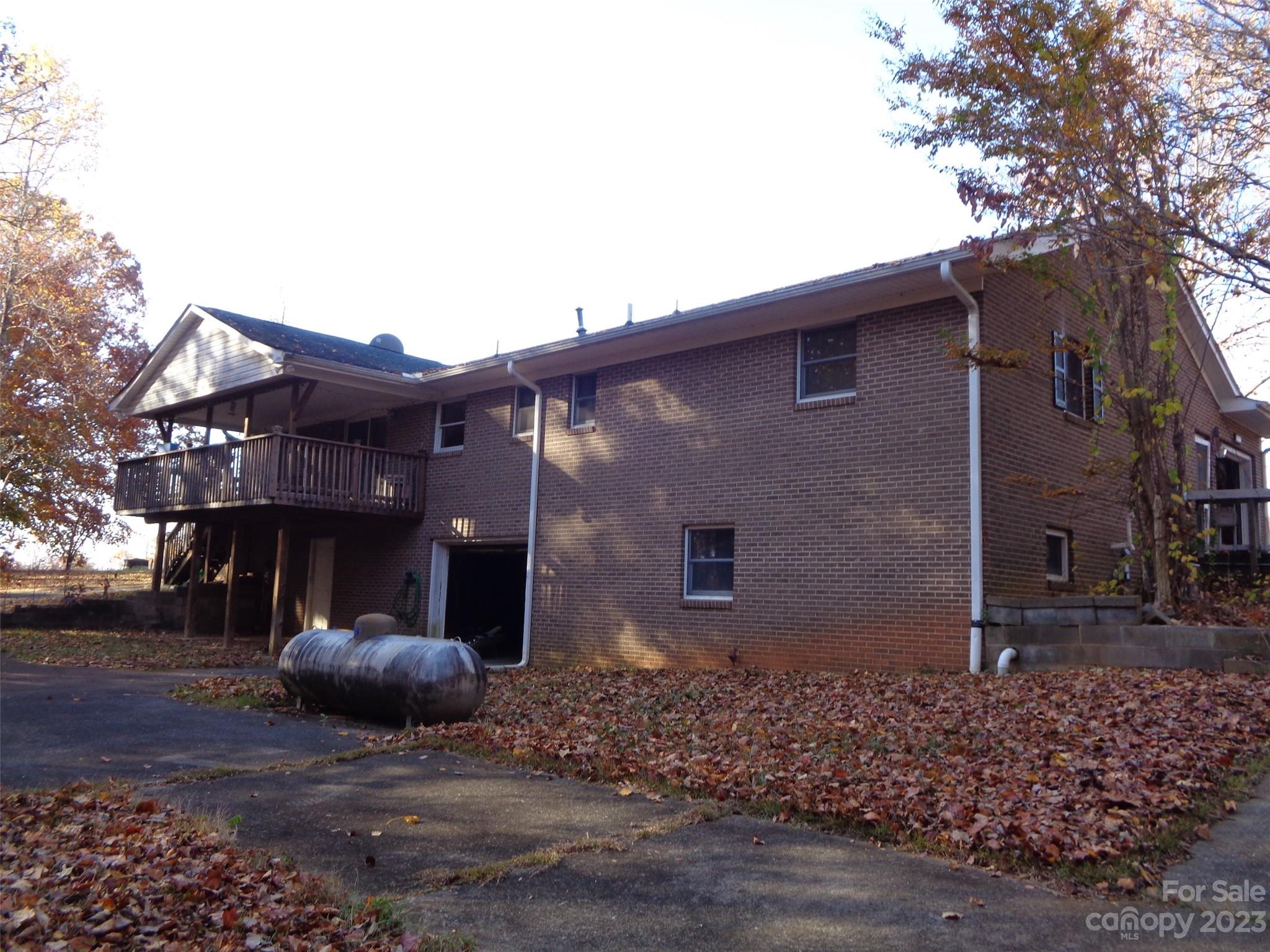320 Luckadoo Road Bostic, NC 28018 - Photo 11 of 24 a view of a house with a patio