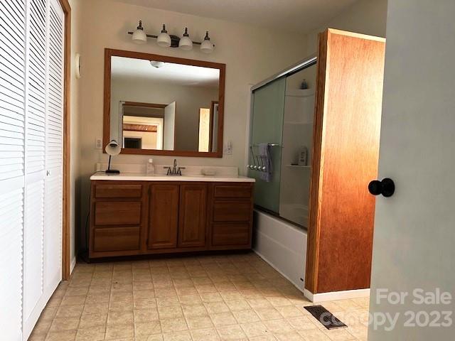 320 Luckadoo Road Bostic, NC 28018 - Photo 17 of 24 a bathroom with a sink a mirror and a shower