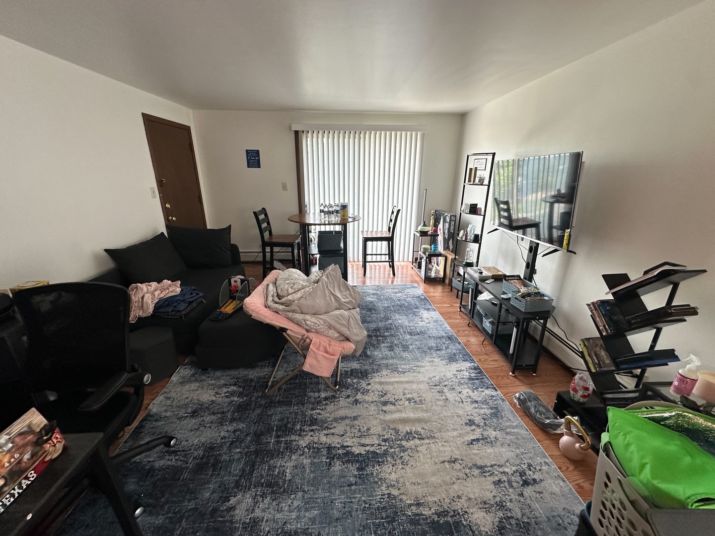 2121 176th Place Lansing, IL 60438 - Photo 23 of 26 a living room with furniture a rug and a window