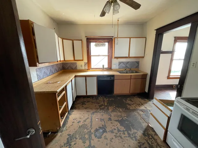 a room with furniture and wooden floor