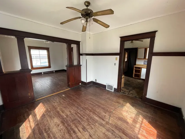 a kitchen with a sink and a refrigerator