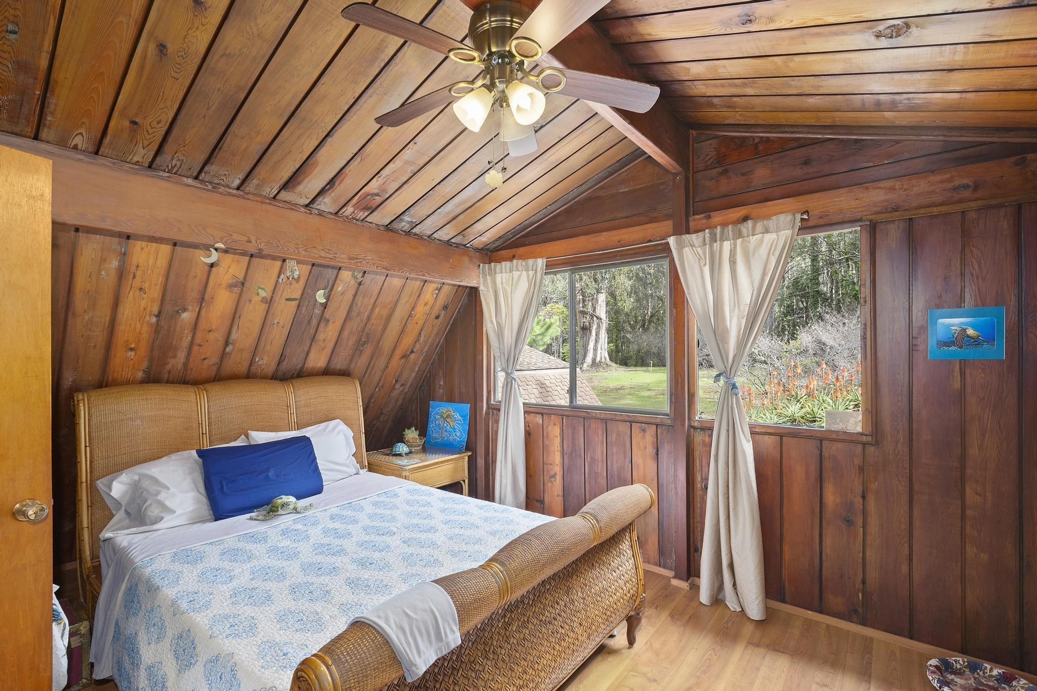 2450 Piiholo Road Makawao, HI 96768 - Photo 30 of 39 a bedroom with a bed and a window