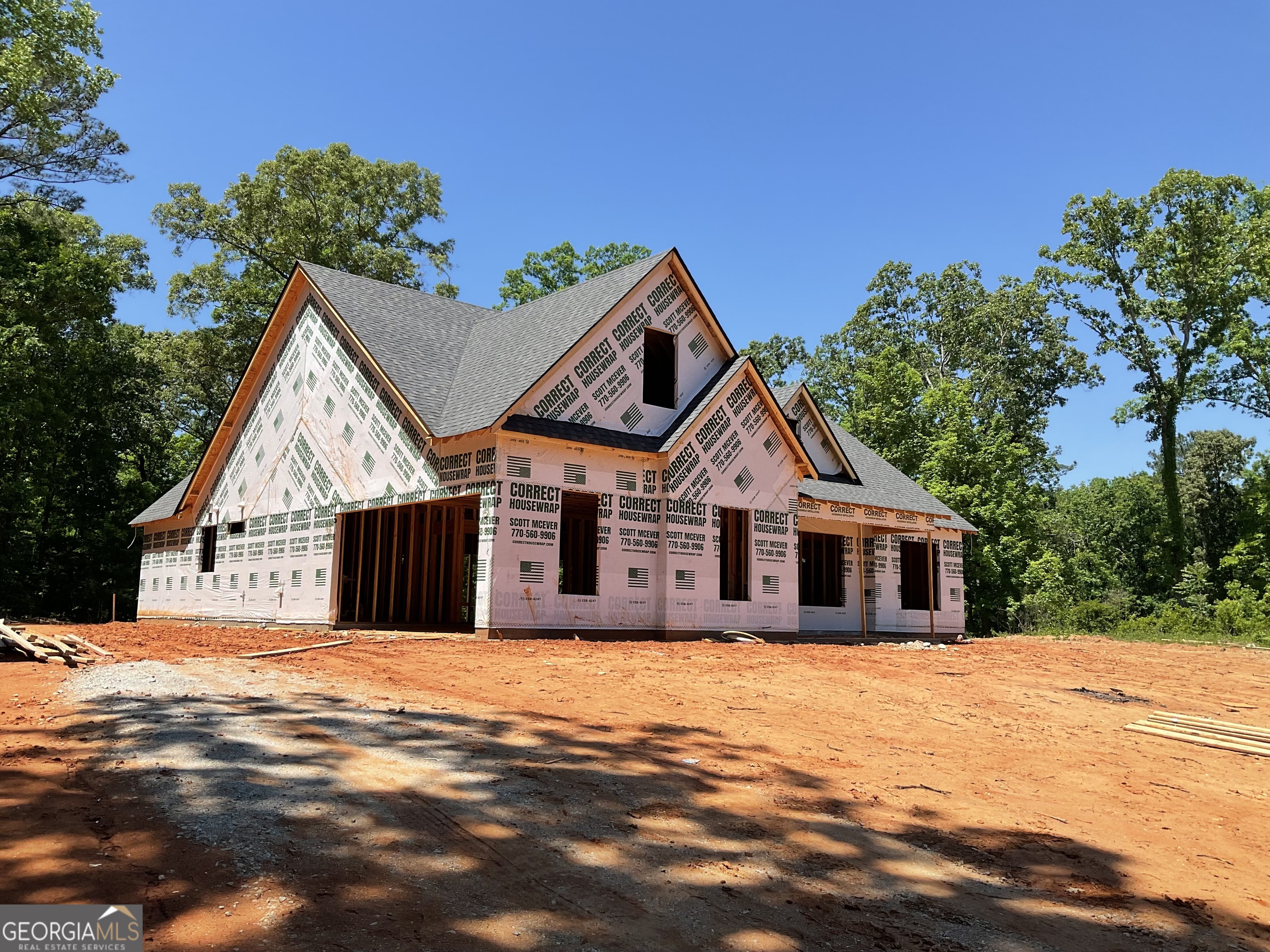 103 Crestview Lane Jackson, GA 30233 - Photo 2 of 6 a front view of a house with a yard