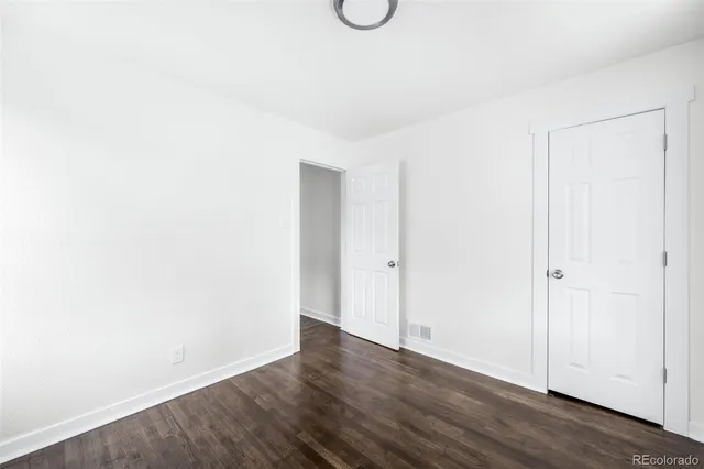 a view of small space with wooden floor