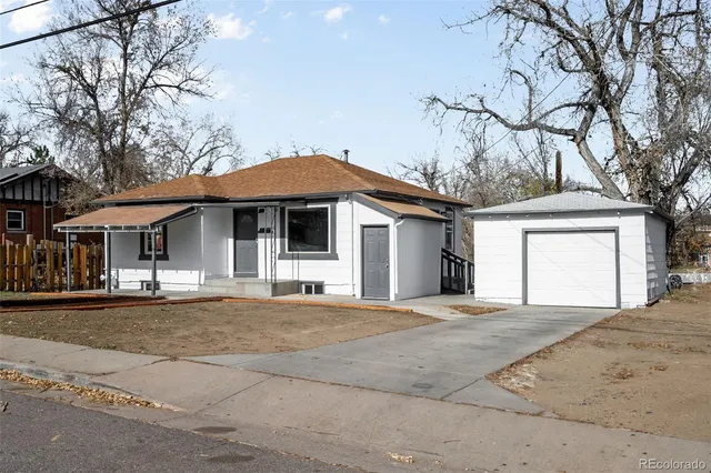a front view of a house with a garage
