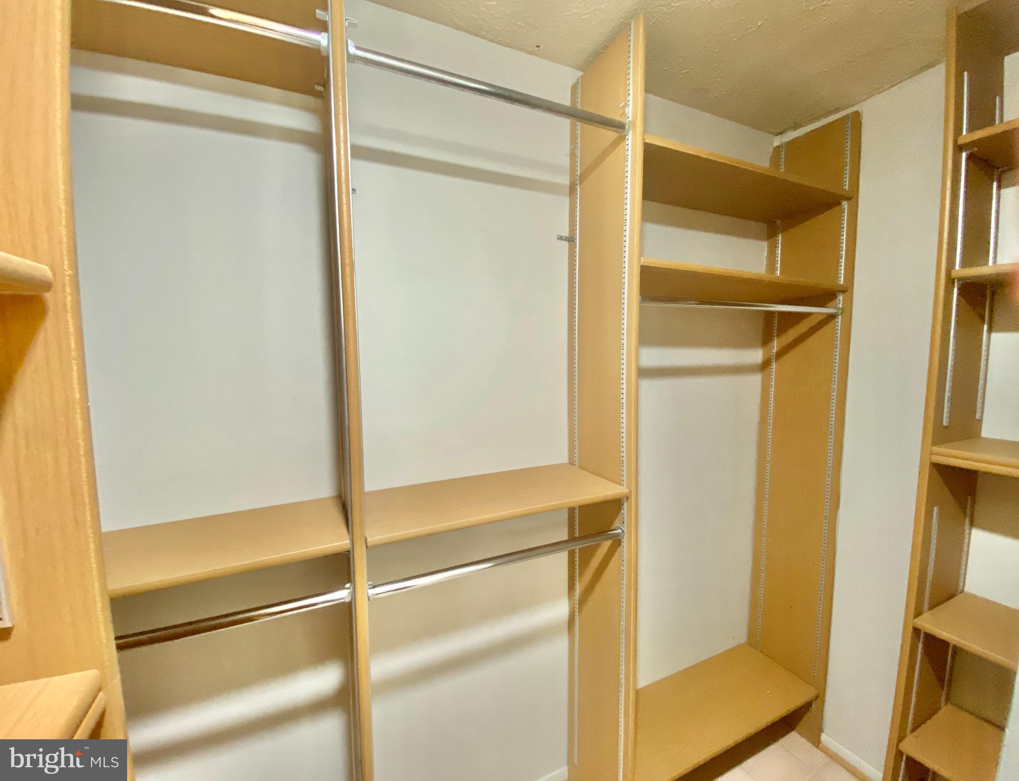 6212 Hillside Road Springfield, VA 22152 - Photo 26 of 36 Primary bedroom walk-in closet custom shelving