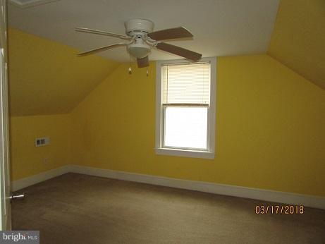 25250 Sotterley Road Hollywood, MD 20636 - Photo 13 of 20 an empty room with a window