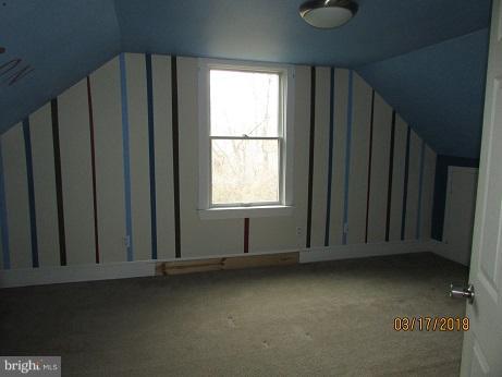 25250 Sotterley Road Hollywood, MD 20636 - Photo 14 of 20 a view of a livingroom with wooden floor and a window