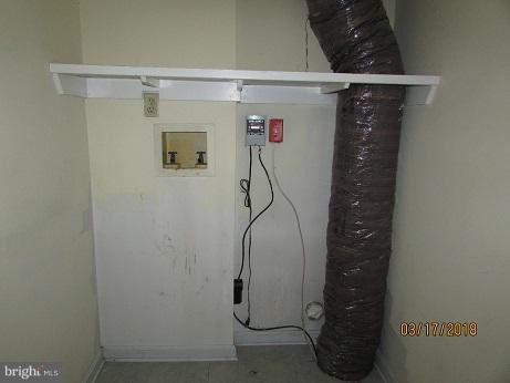 25250 Sotterley Road Hollywood, MD 20636 - Photo 18 of 20 a room with a glass shower door