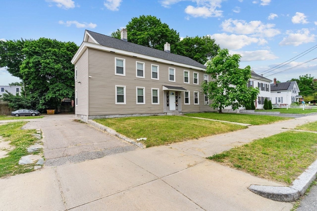 126 Earle Street Woonsocket, RI 02895 - Photo 2 of 42 a view of house with yard and green space