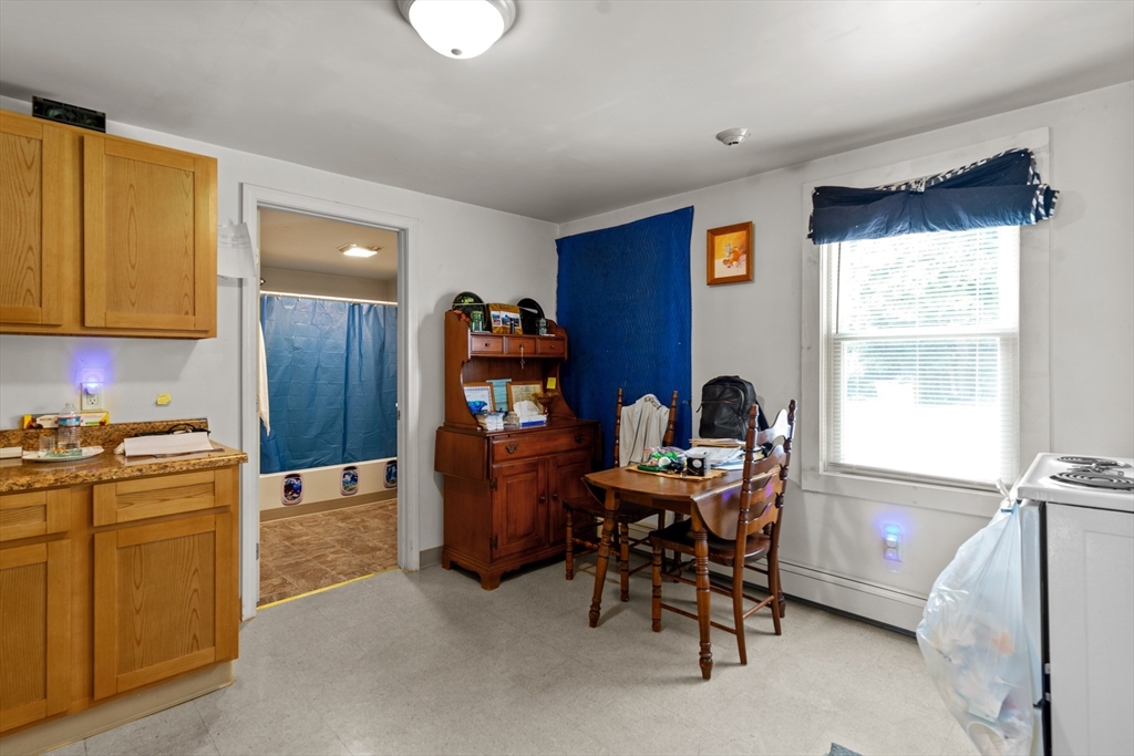 126 Earle Street Woonsocket, RI 02895 - Photo 28 of 42 a workspace with furniture and window