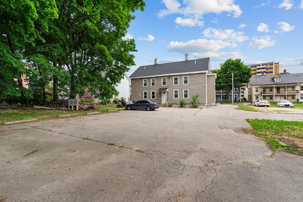 126 Earle Street Woonsocket, RI 02895 - Photo 3 of 42 a view of house with outdoor space and street view