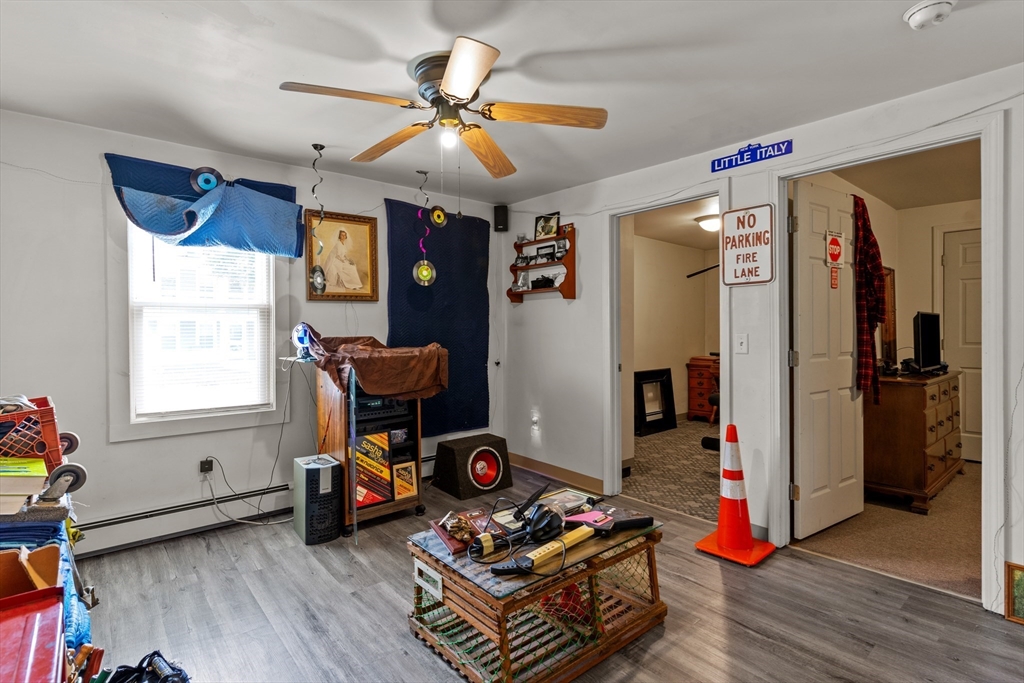 126 Earle Street Woonsocket, RI 02895 - Photo 31 of 42 a living room with furniture and a window