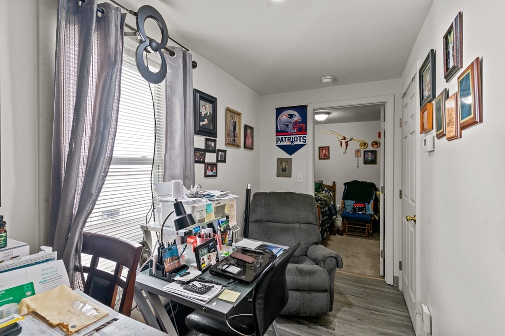 126 Earle Street Woonsocket, RI 02895 - Photo 35 of 42 a living room with furniture and a window