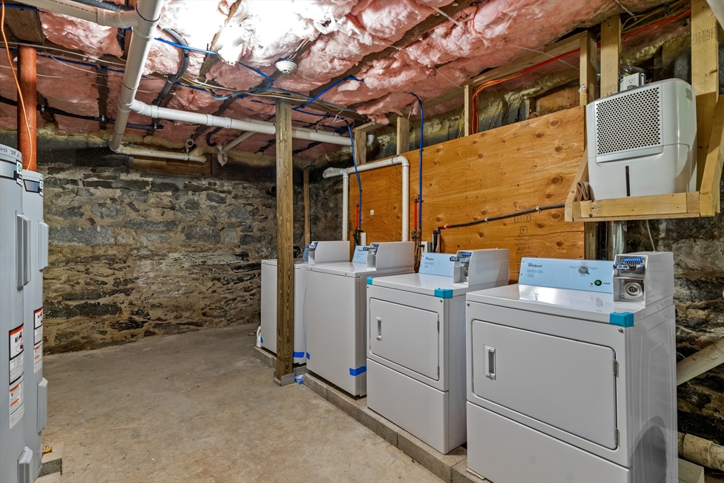 126 Earle Street Woonsocket, RI 02895 - Photo 39 of 42 a utility room with dryer and washer