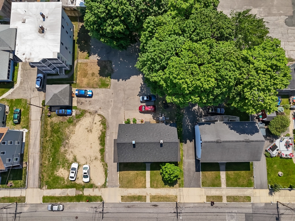 126 Earle Street Woonsocket, RI 02895 - Photo 42 of 42 an aerial view of multiple houses with a yard