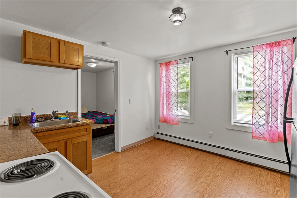 126 Earle Street Woonsocket, RI 02895 - Photo 7 of 42 a room with furniture and window