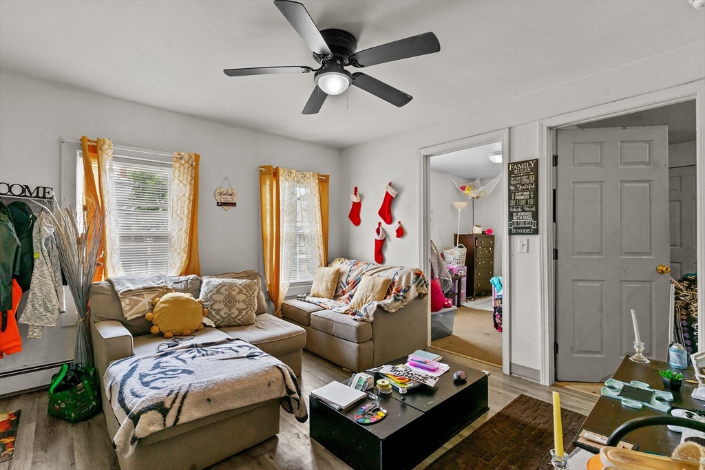 126 Earle Street Woonsocket, RI 02895 - Photo 10 of 42 a bedroom with furniture and a large window
