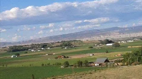 a view of a lake in middle of the town