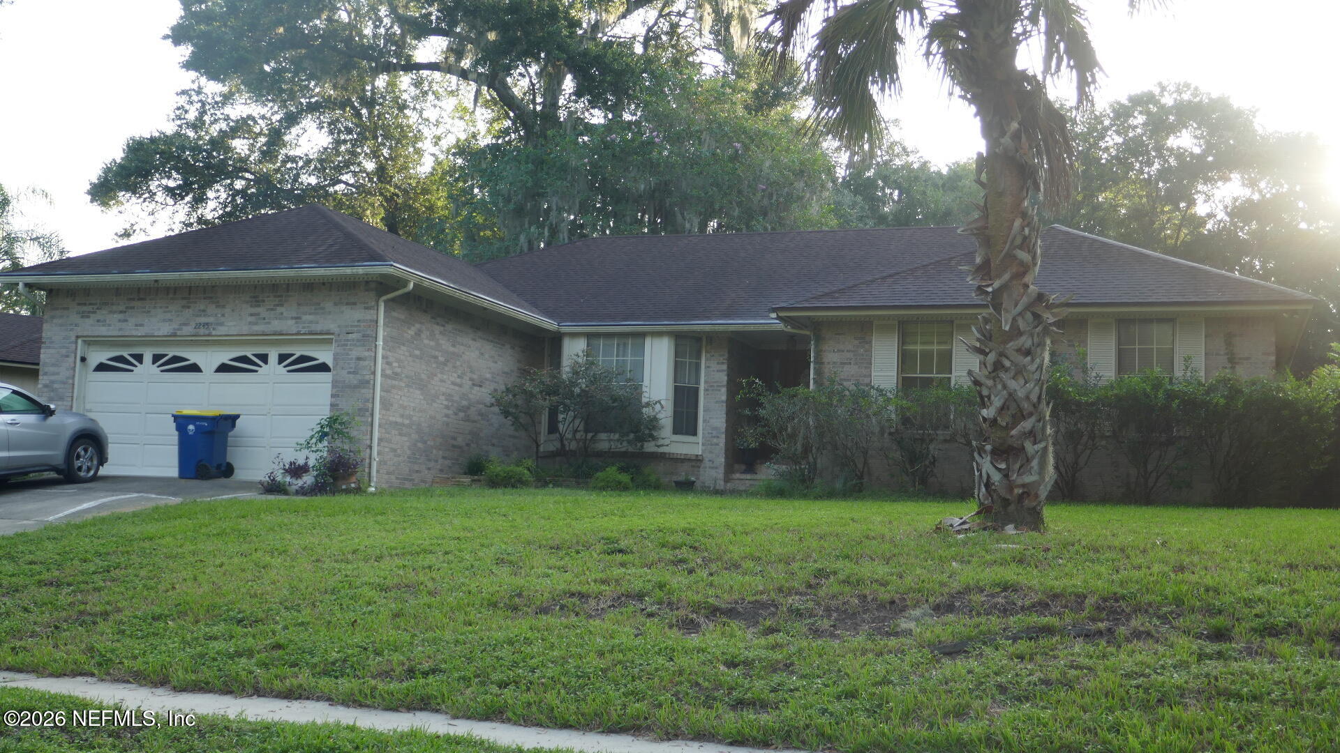 2245 Brentfield Road West Jacksonville, FL 32225 - Photo 1 of 21 a front view of a house with yard and green space