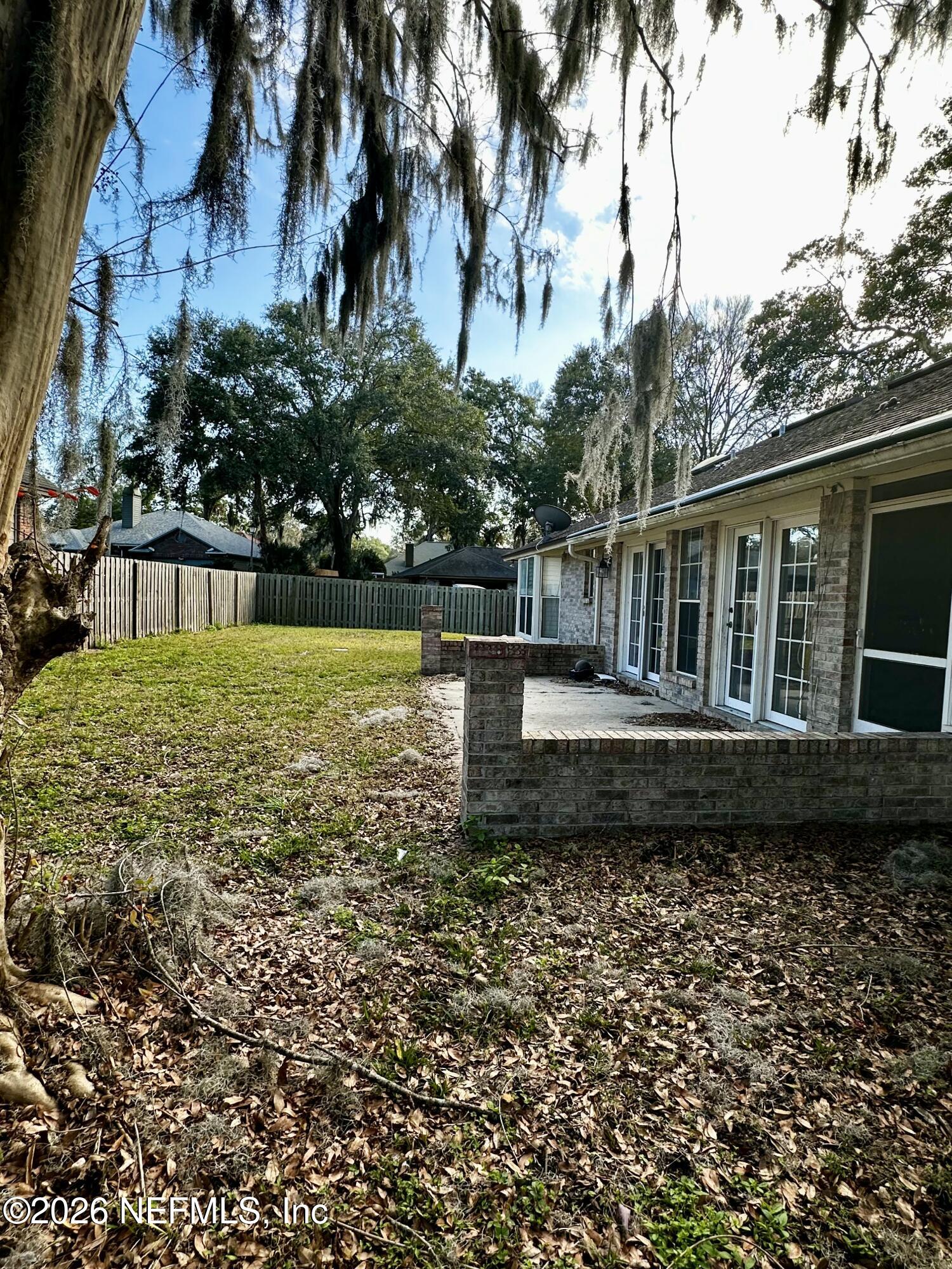 2245 Brentfield Road West Jacksonville, FL 32225 - Photo 21 of 21 a view of a house with a yard