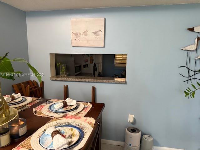 Horizons West Miami, FL 33183 - Photo 13 of 18 a dining room with furniture and wooden floor