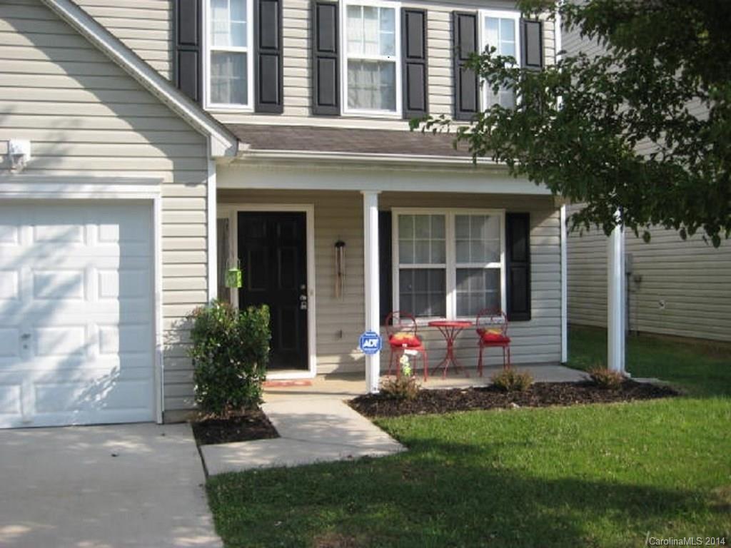 11024 Pointer Ridge Drive Charlotte, NC 28214 - Photo 2 of 8 a front view of a house with a yard