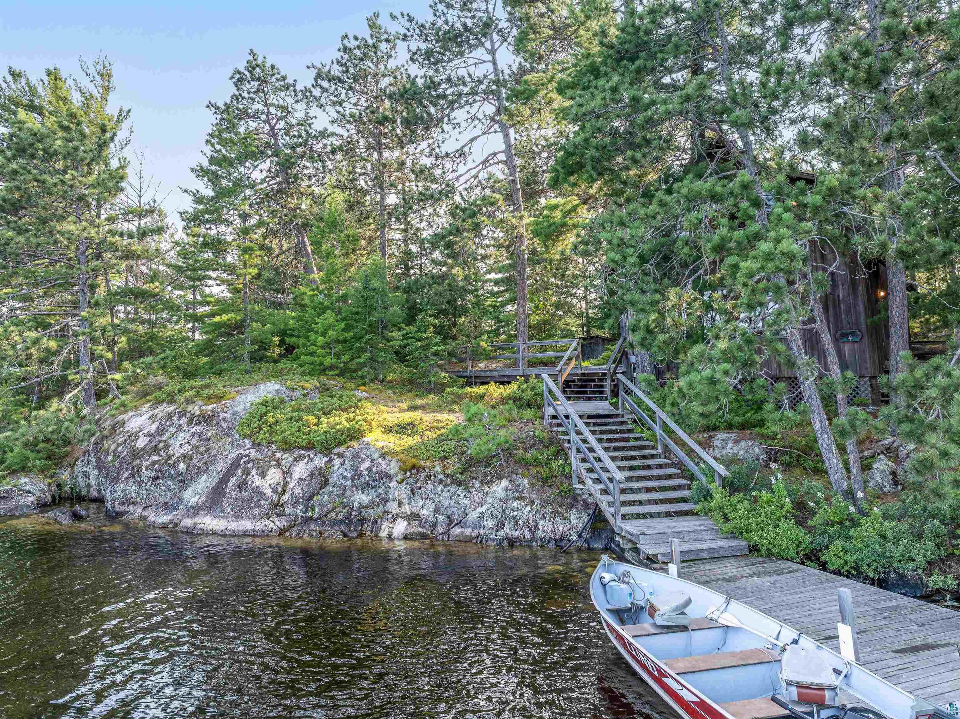 2763 Van Vac Road Ely, MN 55731 - Photo 10 of 37 Wood-plank dock and extensive wooden stairway providing access to the wooded property