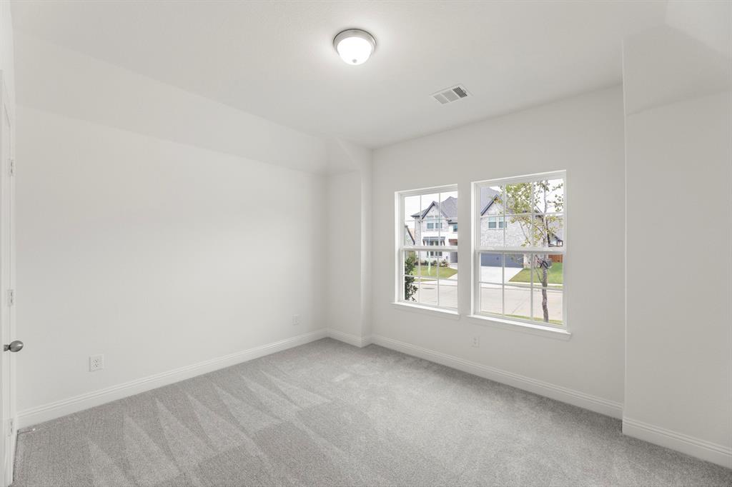 14551 Elion Court Pilot Point, TX 76258 - Photo 20 of 23 an empty room with windows
