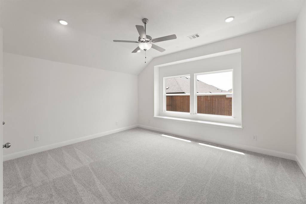 14551 Elion Court Pilot Point, TX 76258 - Photo 9 of 23 a view of an empty room with a window