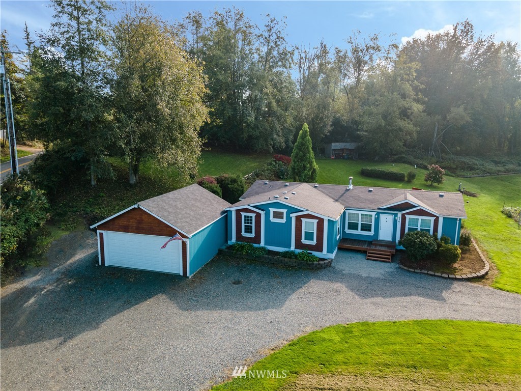 6361 Malloy Road Ferndale, WA 98248 - Photo 3 of 39 an aerial view of a house with swimming pool garden view and trees