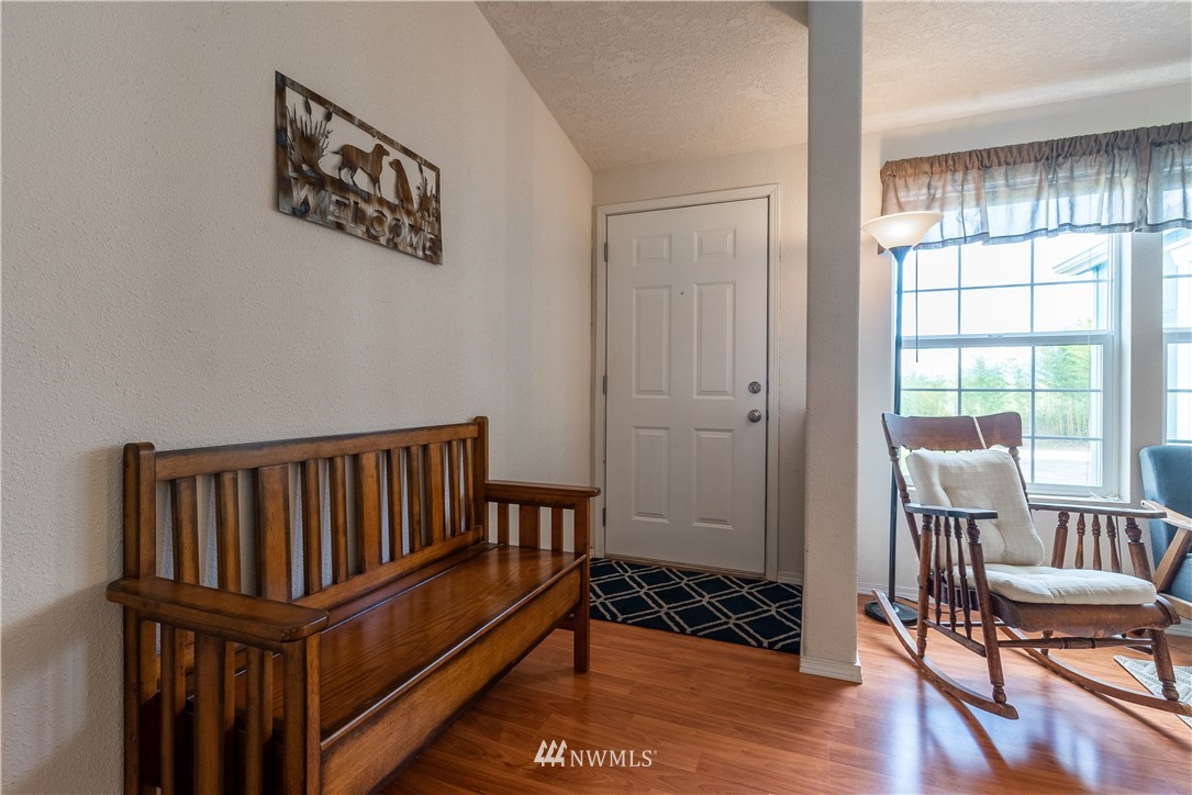 6361 Malloy Road Ferndale, WA 98248 - Photo 8 of 39 a bedroom with furniture and a window