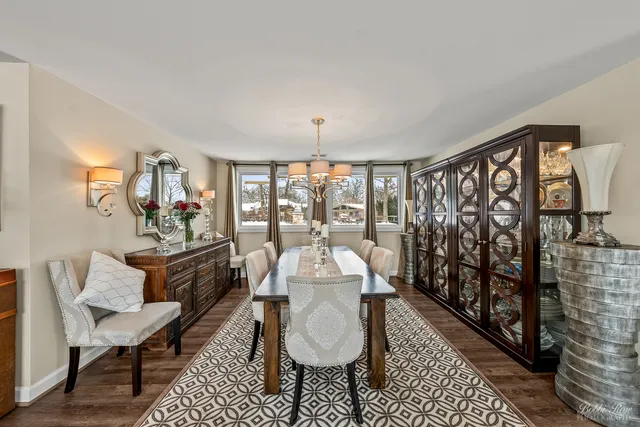 a view of a wooden deck and a garden