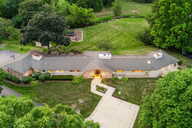 a backyard of a house with lots of green space
