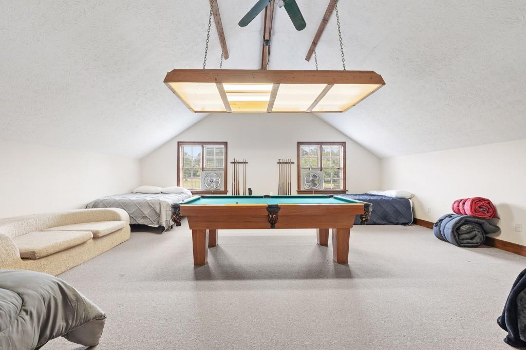 3780 Brownwood Road Madison, GA 30650 - Photo 20 of 25 a dining room with furniture and a chandelier