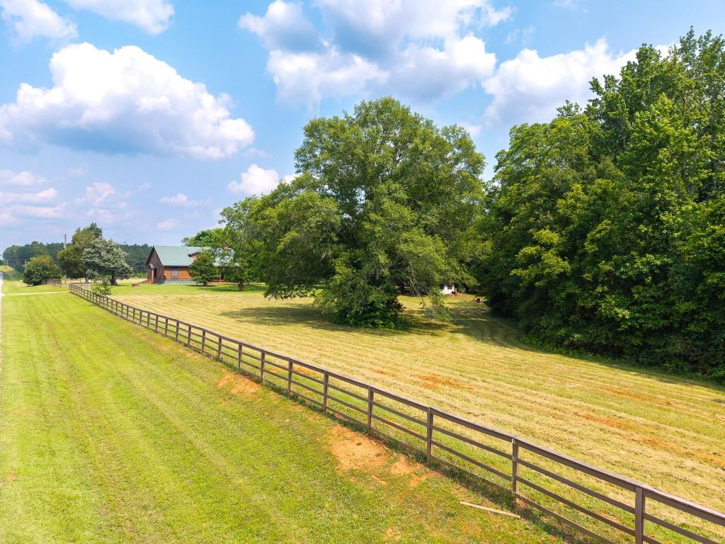 3780 Brownwood Road Madison, GA 30650 - Photo 5 of 25 a view of an outdoor space and swimming pool