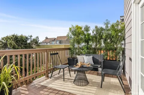 a bathroom with a sink vanity and a mirror