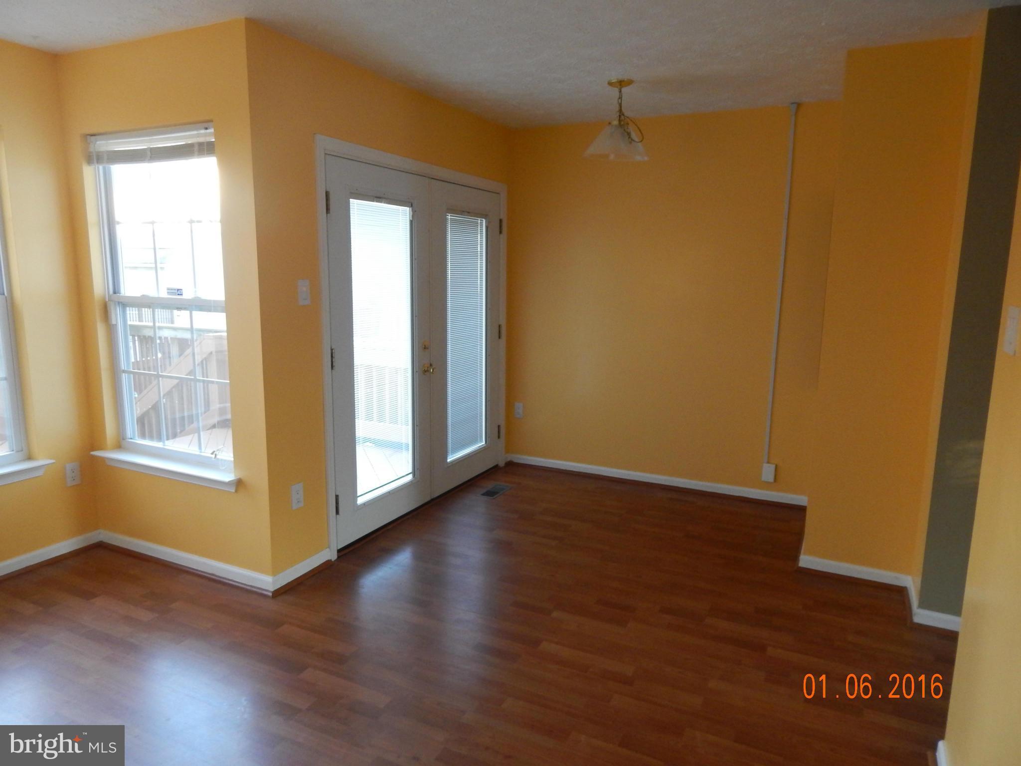 2033 Hackberry Road Baltimore, MD 21221 - Photo 4 of 14 Kitchen Dining Area Sliders to Deck