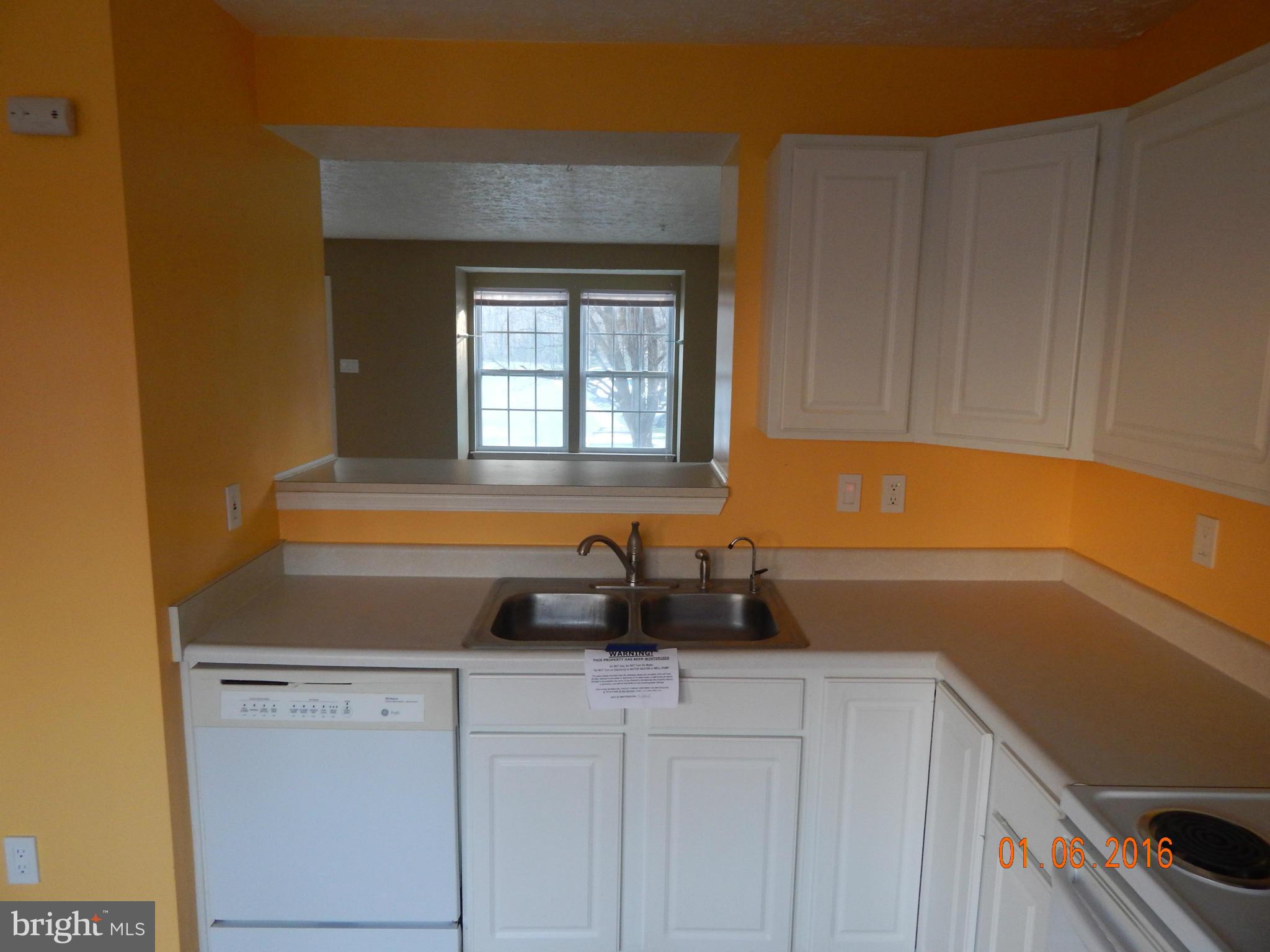 2033 Hackberry Road Baltimore, MD 21221 - Photo 5 of 14 Kitchen Pass Thru to LR/DR