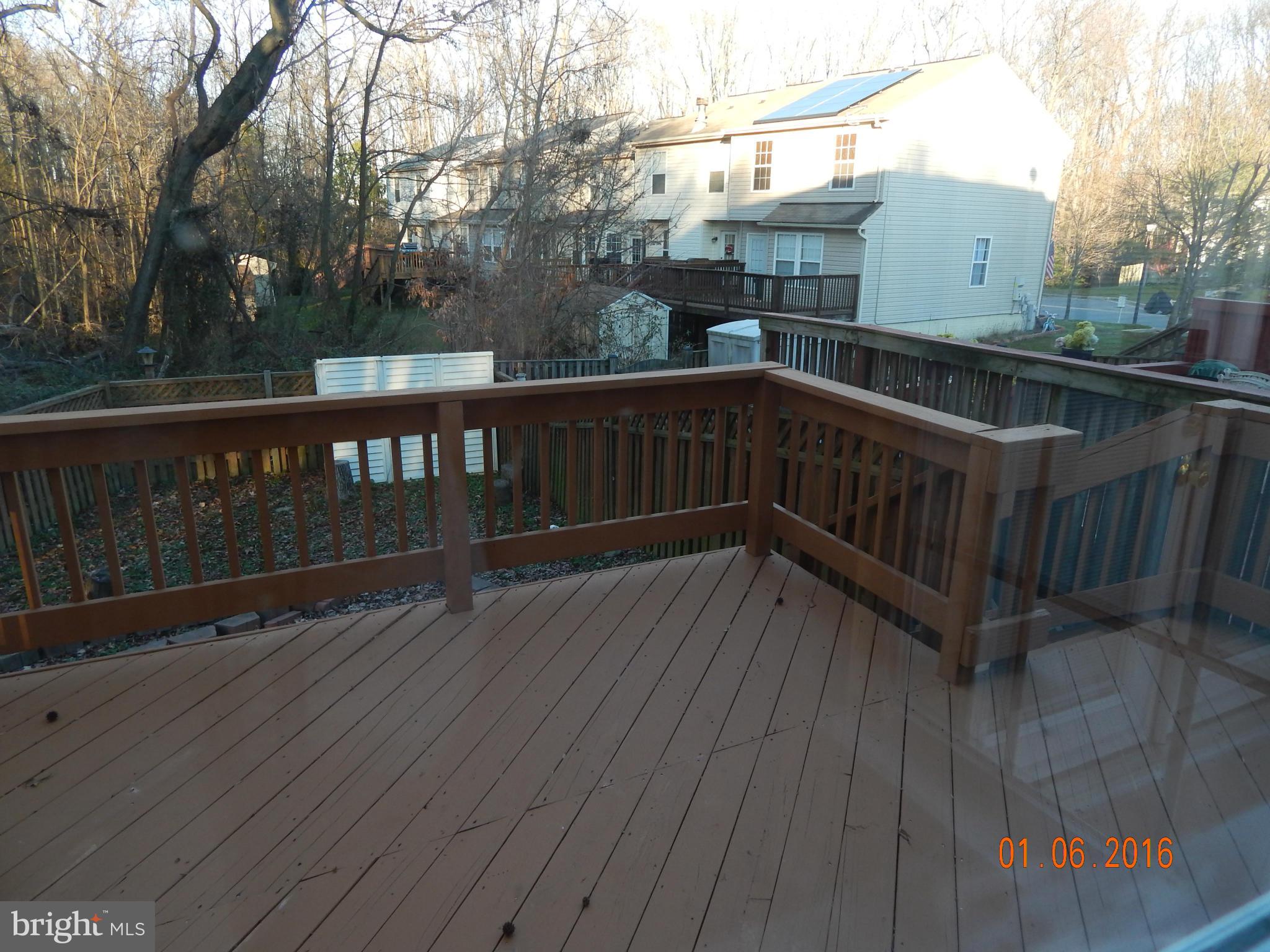2033 Hackberry Road Baltimore, MD 21221 - Photo 6 of 14 LG Deck Overlooking Parklike Yard