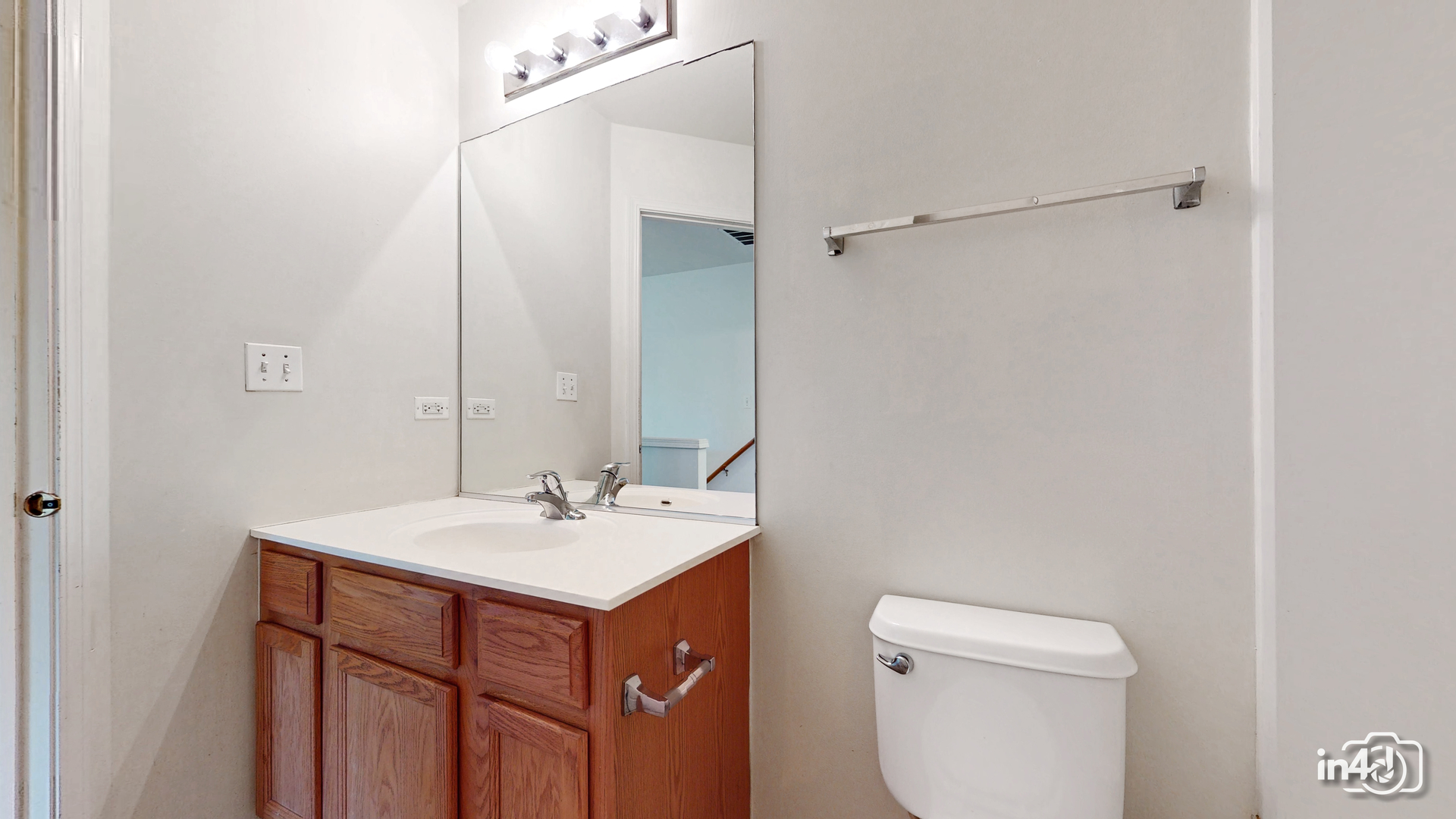 529 Metropolitan Street Aurora, IL 60502 - Photo 21 of 29 a bathroom with a sink toilet and shower