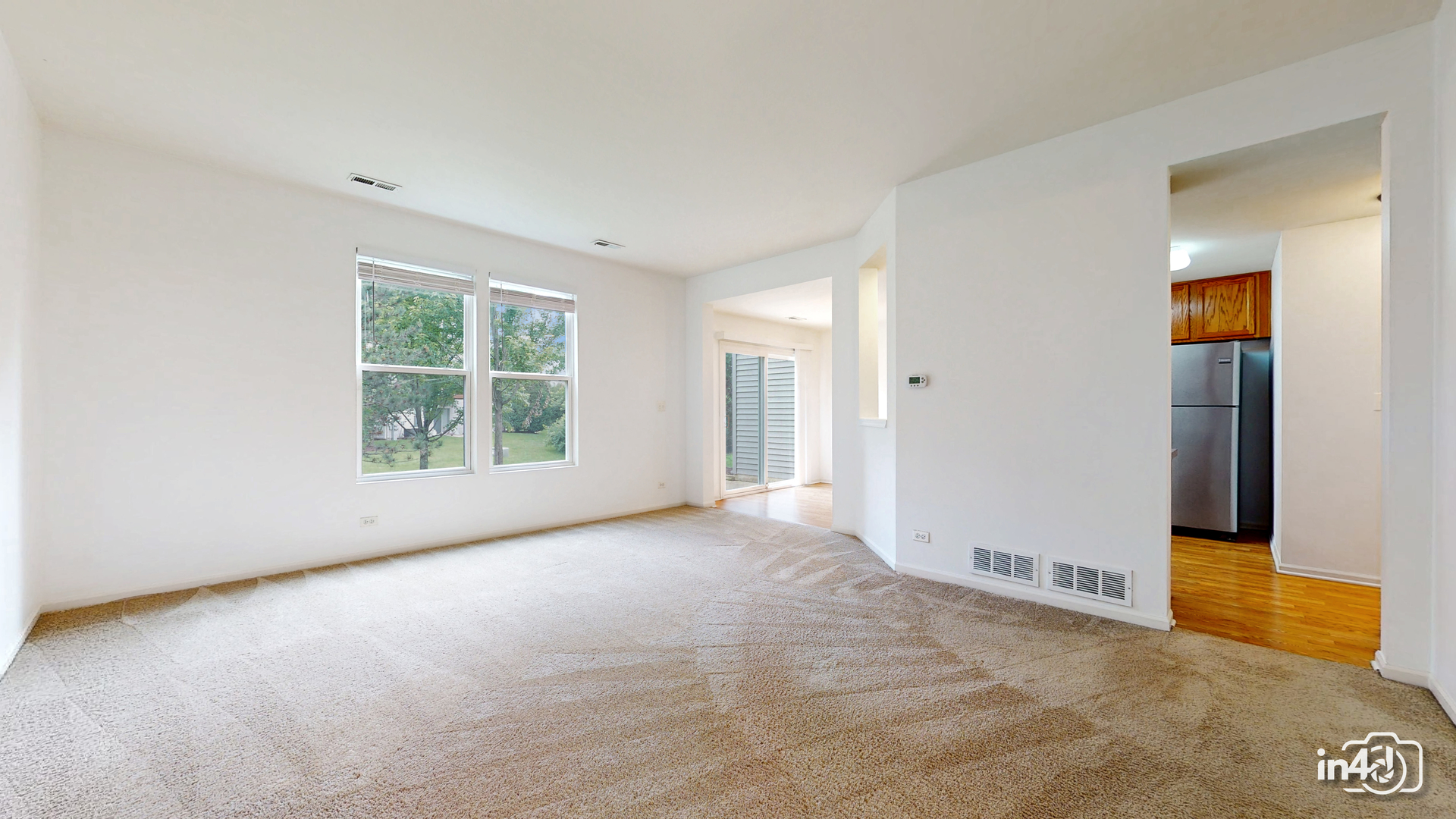529 Metropolitan Street Aurora, IL 60502 - Photo 3 of 29 an empty room with windows