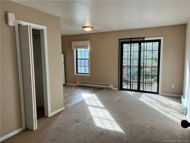 an empty room with windows