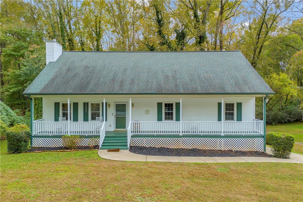 140 Breckenridge Lane Athens, GA 30606 - Photo 1 of 36 a view of house with yard and sitting area