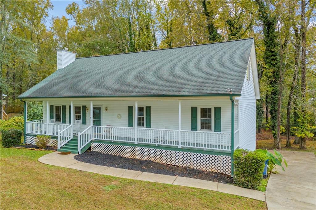 140 Breckenridge Lane Athens, GA 30606 - Photo 2 of 36 a view of a house with pool and chairs